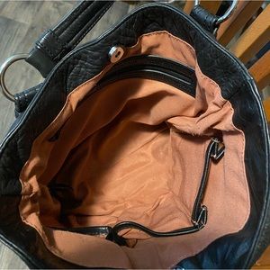 Stone Mountain black leather purse.